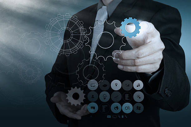 businessman-hand-show-gear-to-success-as-concept